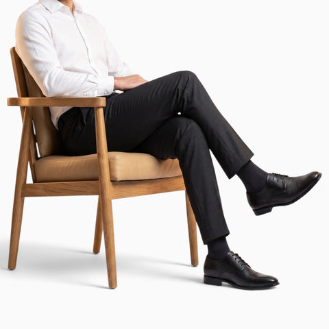 Elegant handmade leather Derby shoes crafted for comfort and style, perfect for formal occasions.