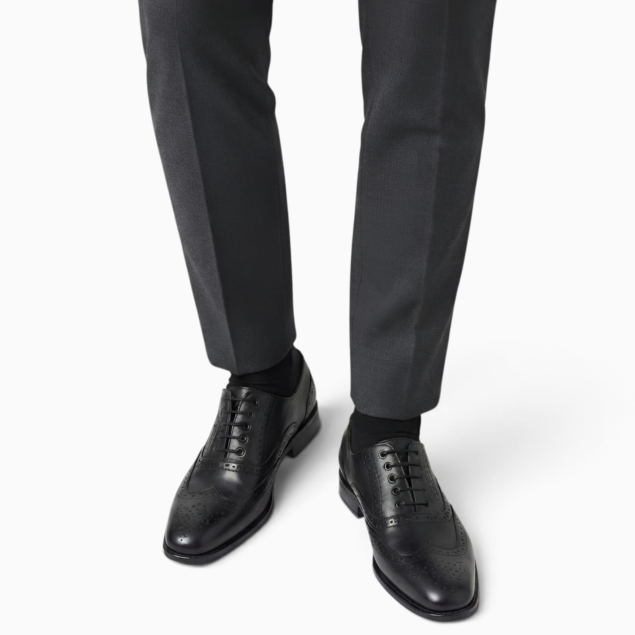 Elegant handmade brogue shoes showcasing intricate craftsmanship and classic design for refined style.