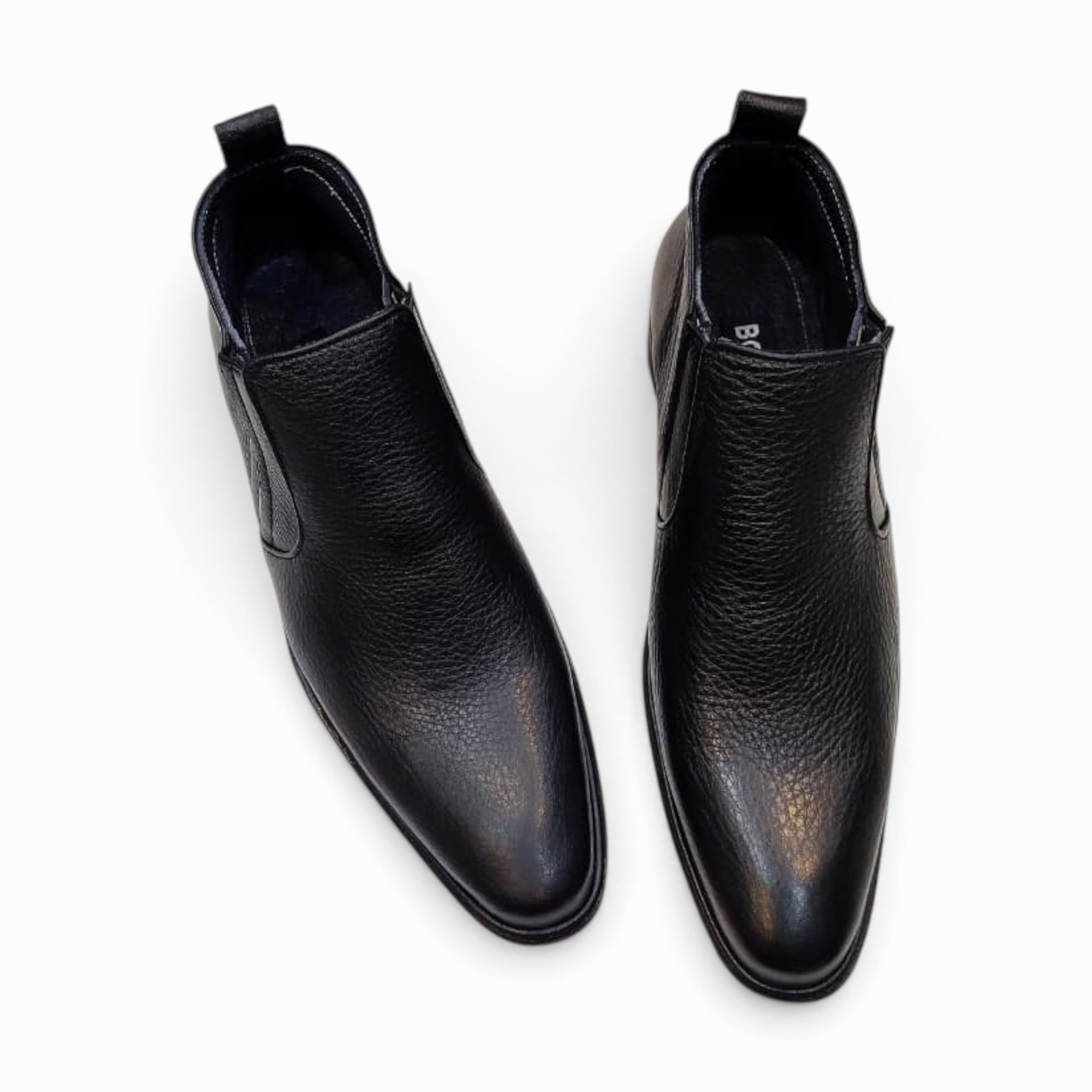 Chelsea leather boots offering classic style and superior comfort, perfect for any formal or casual occasion.