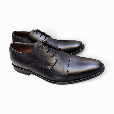 Elegant handmade leather Derby shoes crafted for comfort and style, perfect for formal occasions.