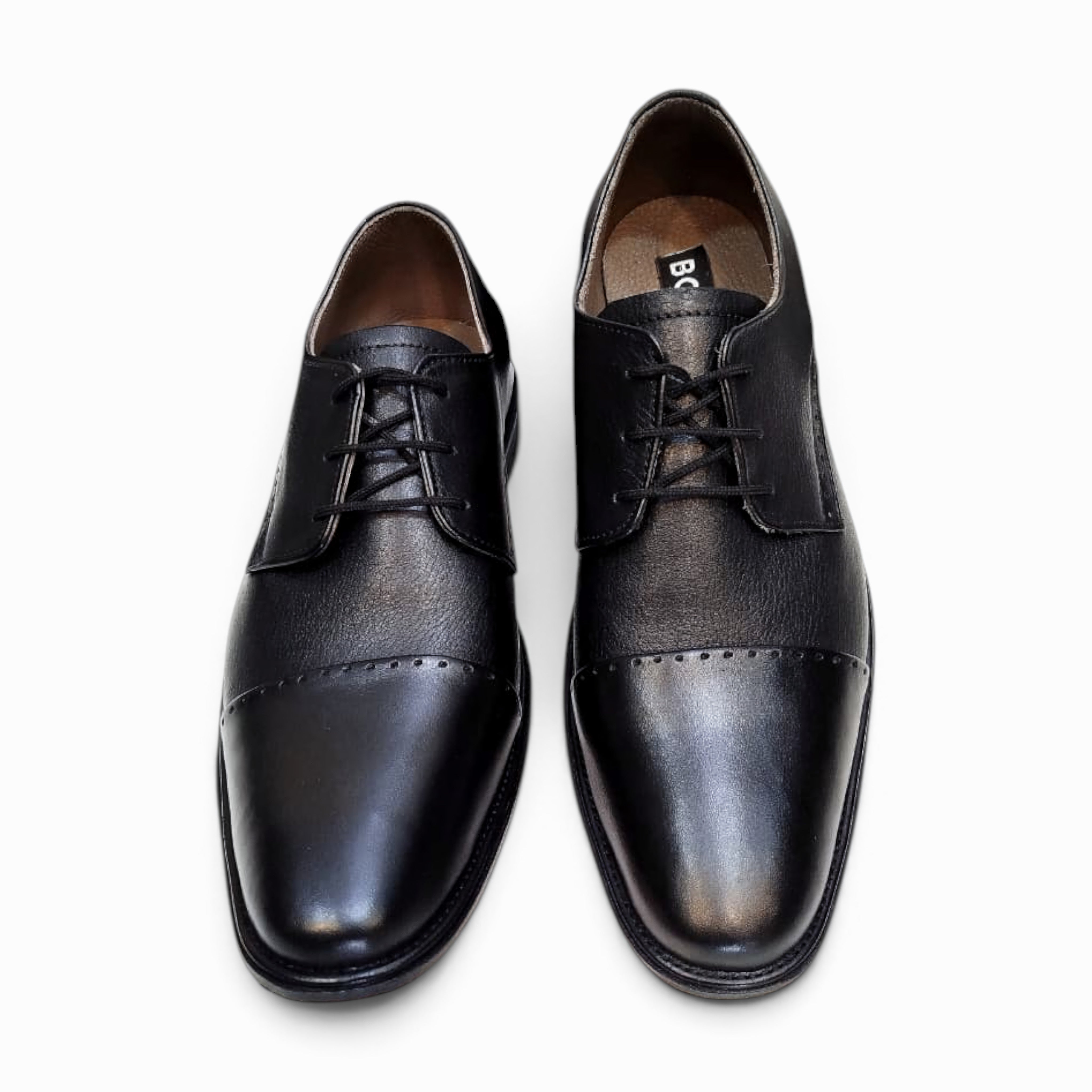 Elegant handmade leather Derby shoes crafted for comfort and style, perfect for formal occasions.